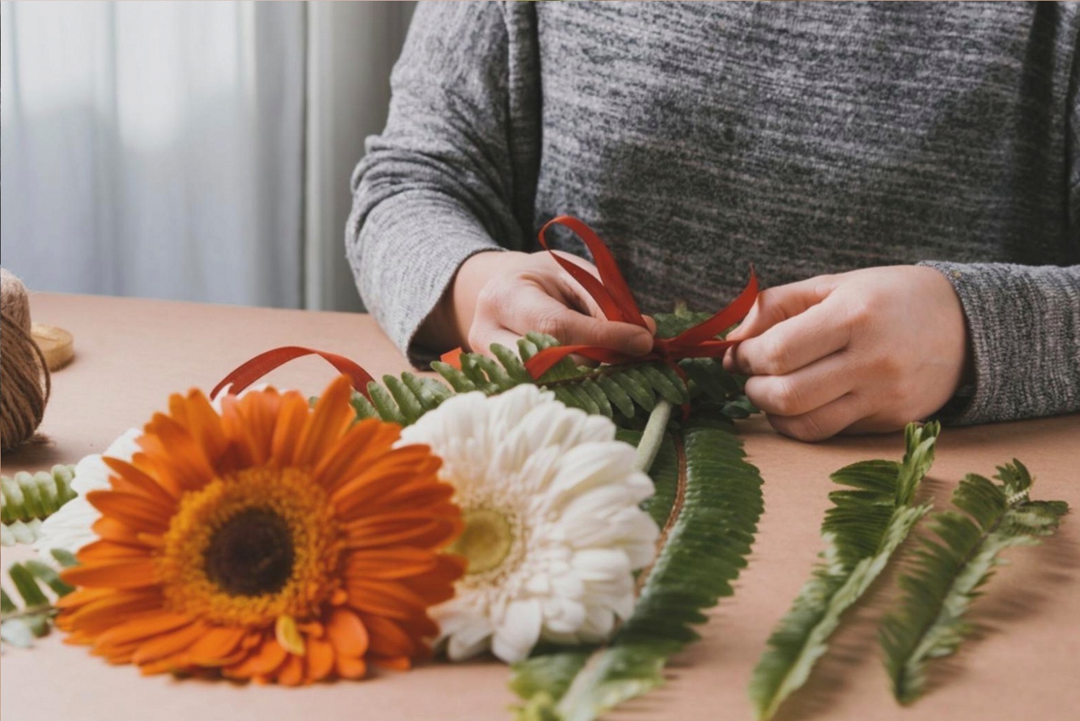 Prizelio team setting up floral display at venue